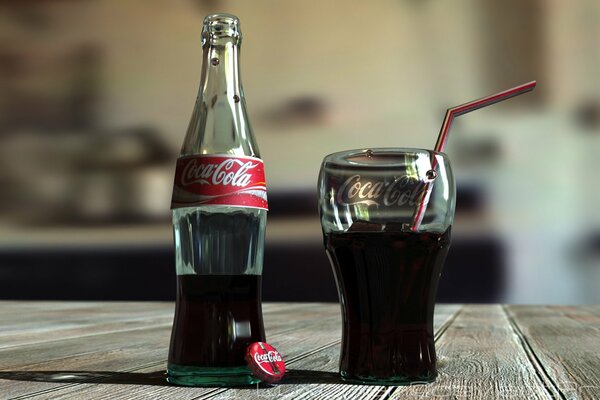 A glass of Coca-Cola with a straw