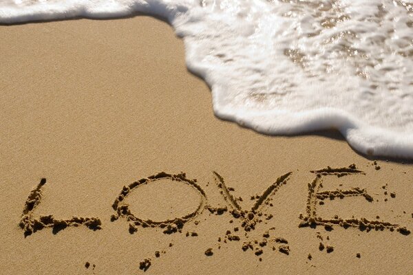 The word love on the beach near the arriving vrlna