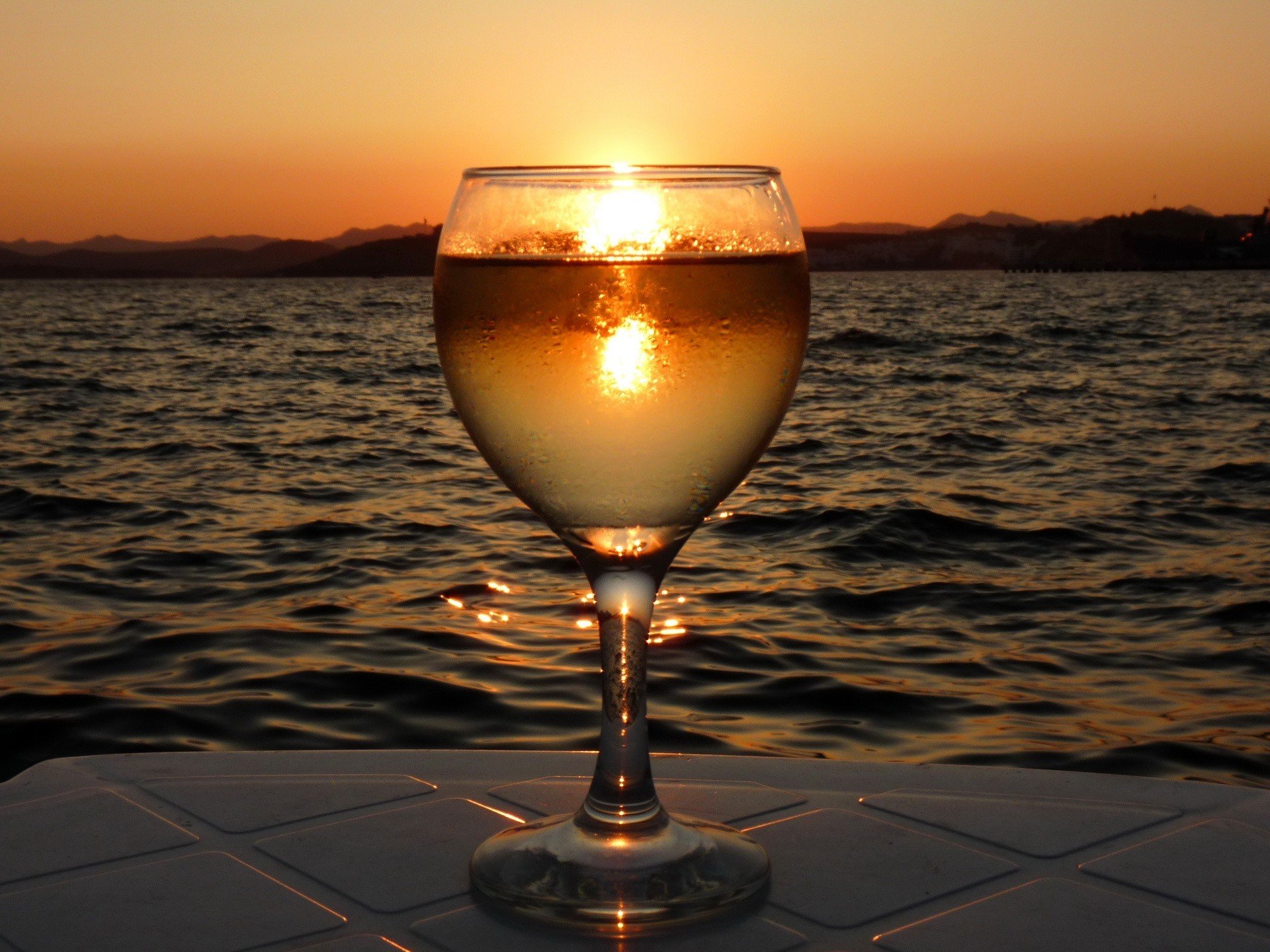 glass sunset water