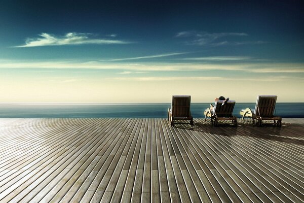 Détendez-vous sur une chaise longue au bord de la mer