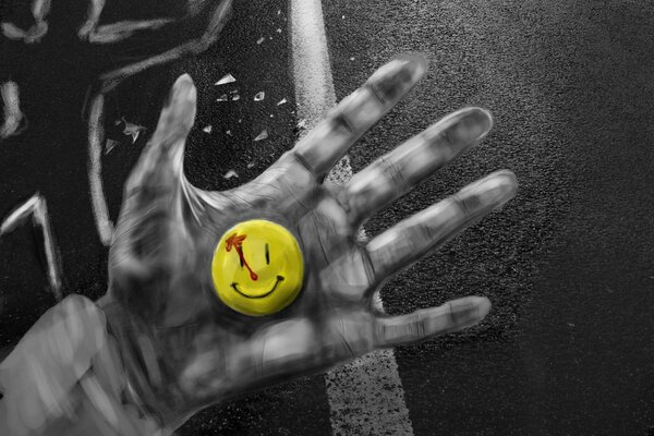 Smiley in der Hand. Düsteres Bild