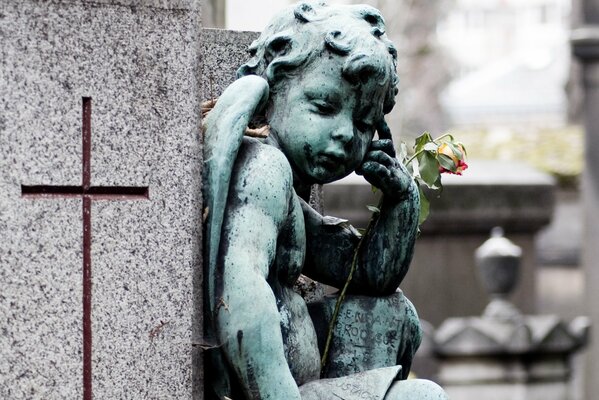 Sculpture of an angel with a flower