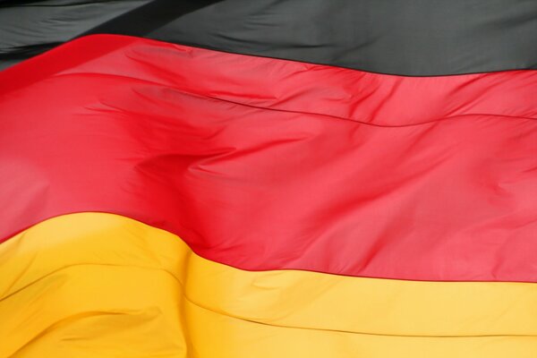 Hintergrund der hellen Flagge Deutschlands