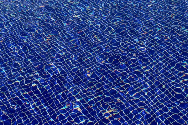 Texture dans la piscine l eau est inhabituelle lumineuse