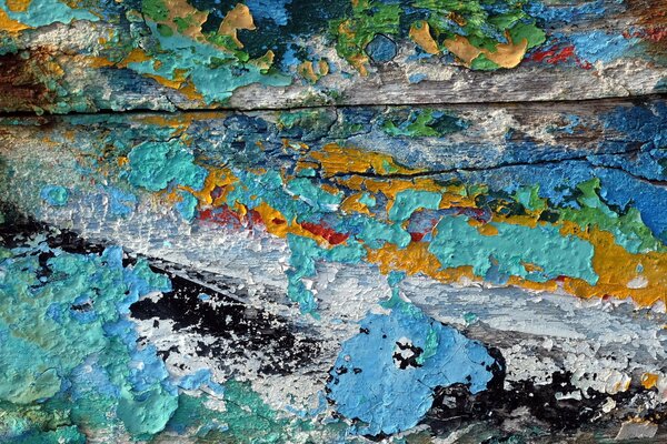 The texture of wood and paint. Multicolored background