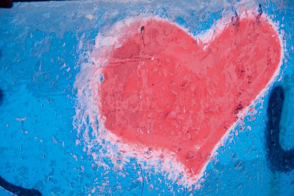 A big heart on a blue wall