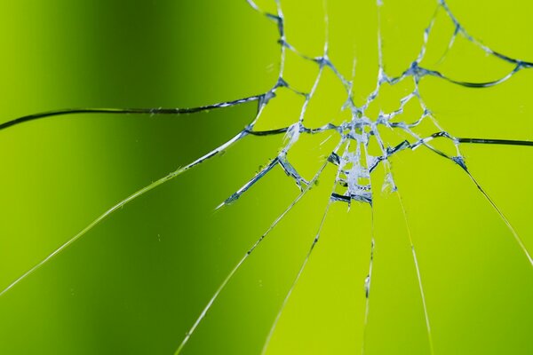 Green background with broken glass