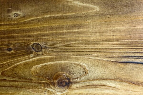 The texture of the wooden panel near