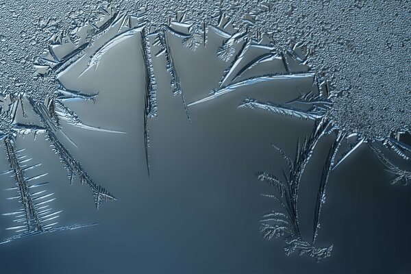 Beautiful pattern on ice in winter frost