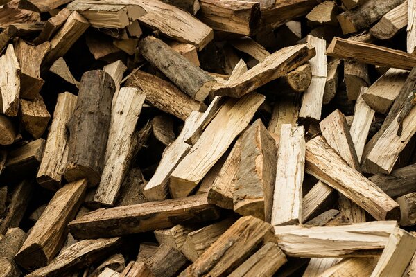 Brown background from a pile of logs