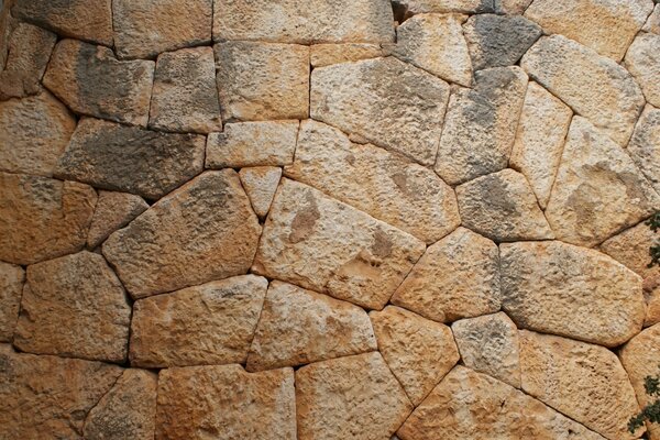 Pared de ladrillo y piedra marrón