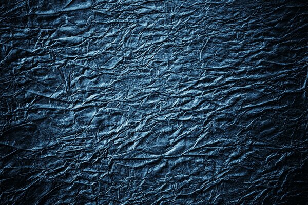 Background of blue crumpled paper