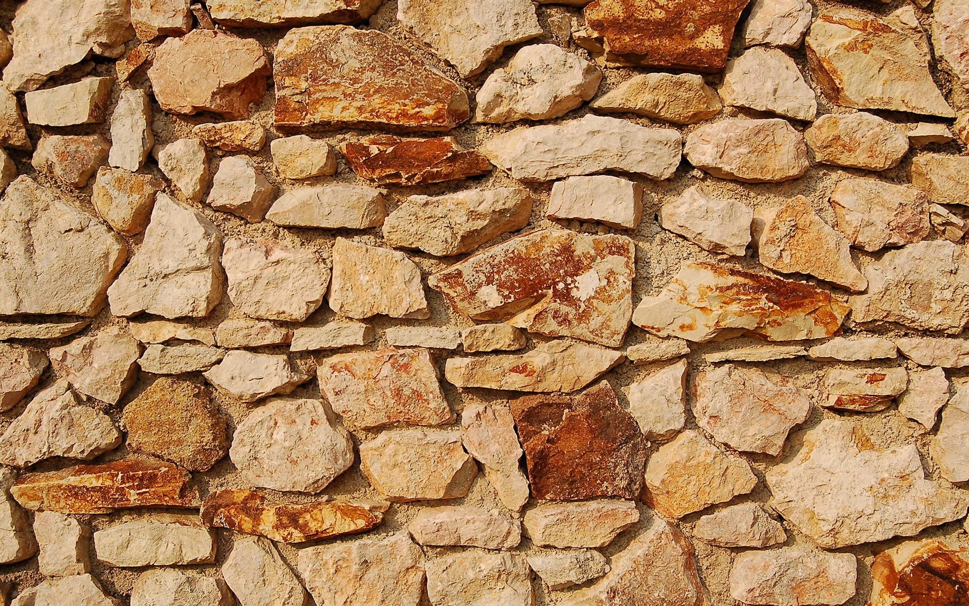 blocks of stone wall yellow red pattern