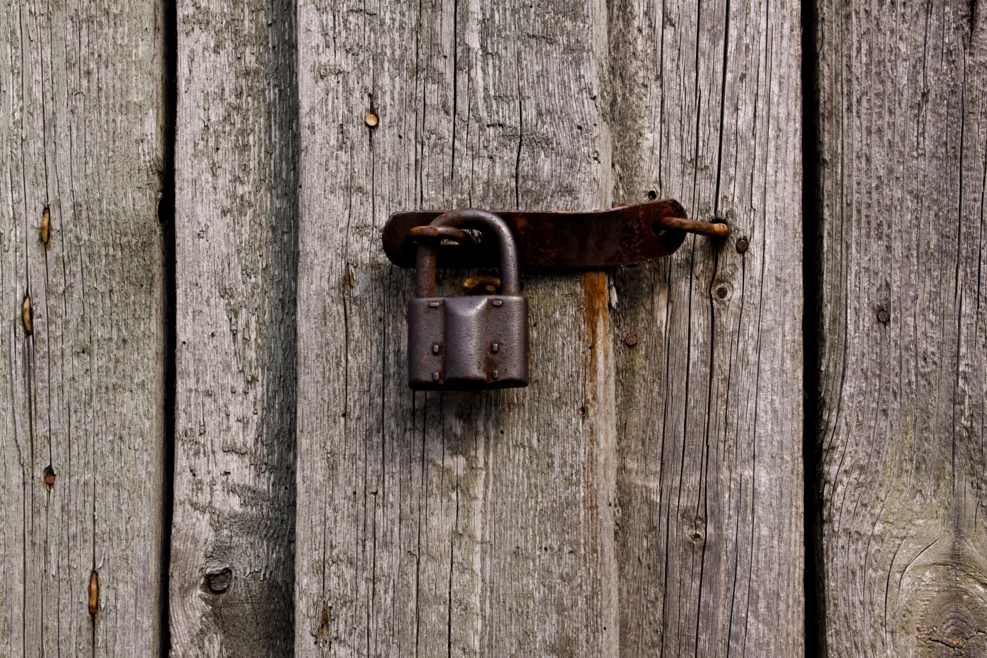 pattern metal padlock wood