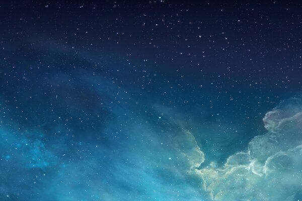 Blue starry sky with clouds