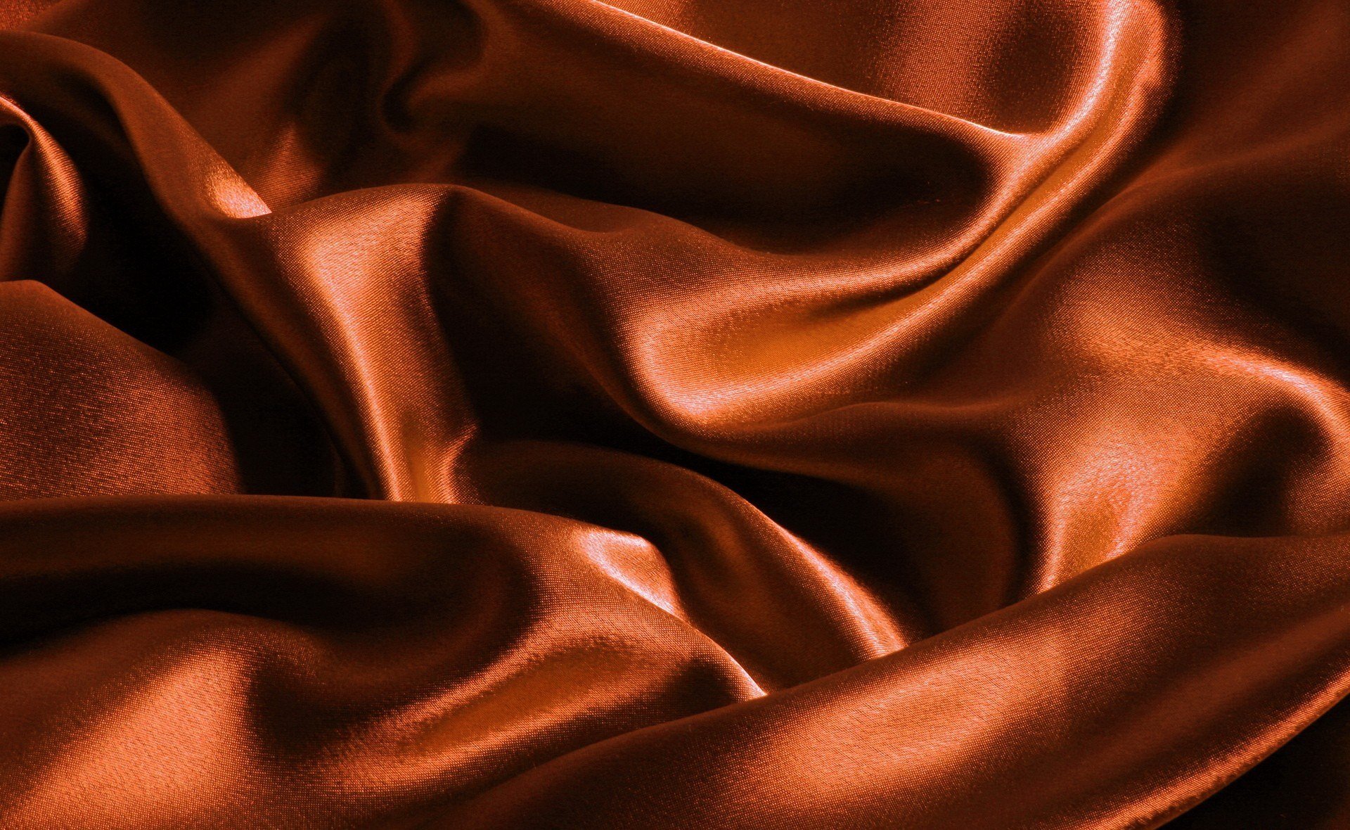 textur hintergrund stoff seide satin orange braun überläufe schön farbe