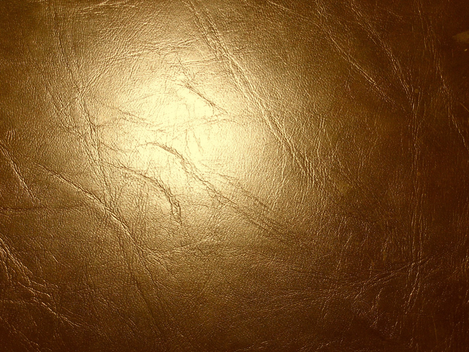 leder gold glanz risse textur