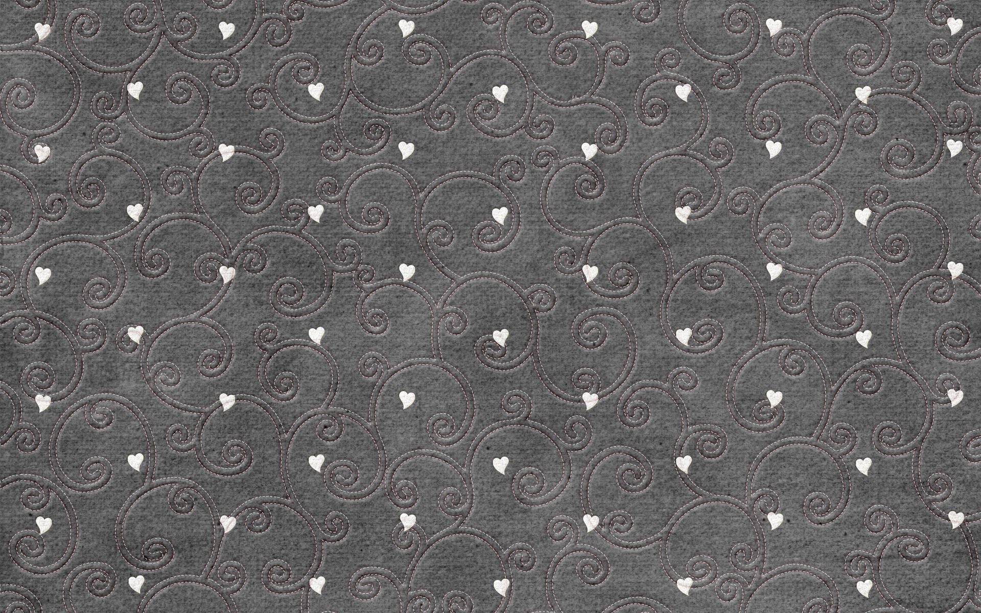 heart curls stitches cloth gray background