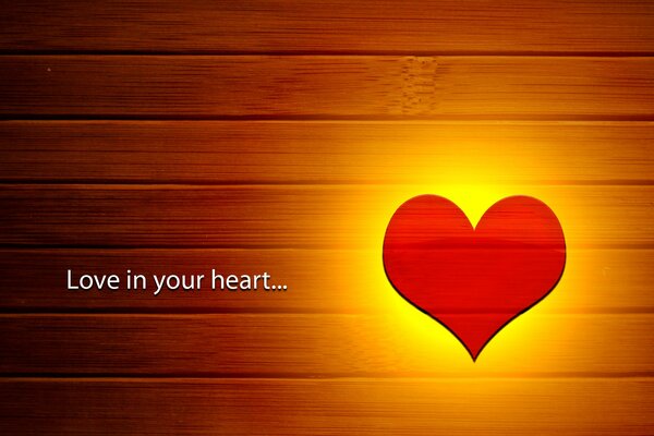 Red heart on wooden texture