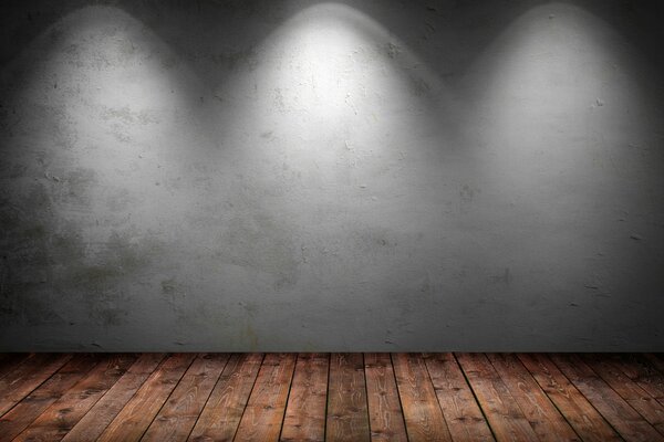 The texture of the gray wall is illuminated by light