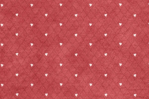 Su sfondo rosso a forma di diamante cuori bianchi
