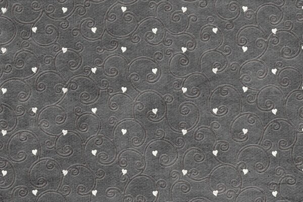 Tissu gris avec coeurs blancs et boucles