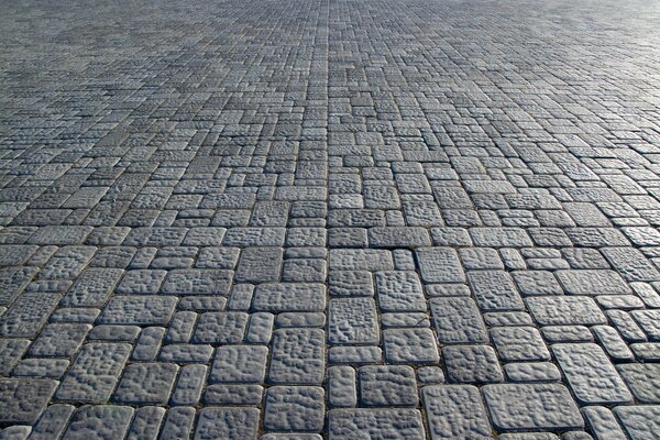 Pavé de pierre grise sur le trottoir