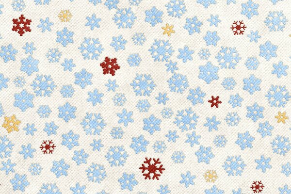 Fond de tissu-flocons de neige bleus avec des taches de rouge et de jaune
