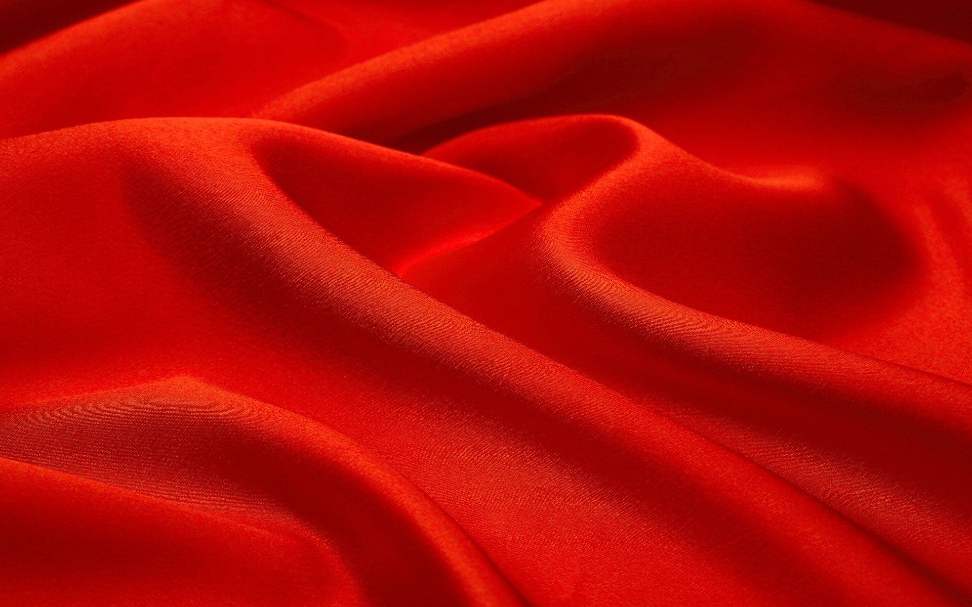 texture fond rouge tissu plis vagues