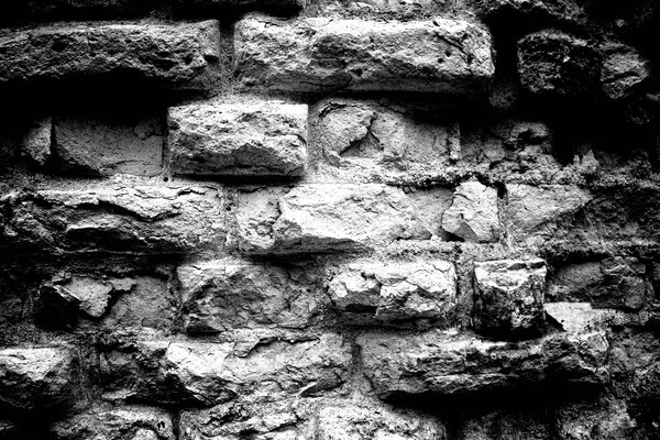 Black and white background with bricks