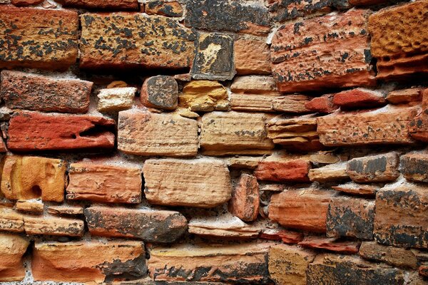 Worn brick red wall