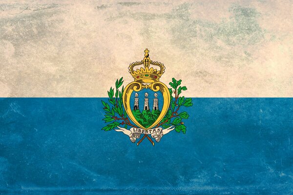 Die Flagge von San Marino. Weiß-blauer Hintergrund mit Wappen in der Mitte