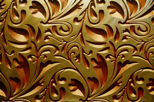 Golden patterns on a brown background