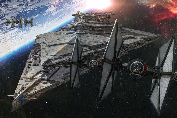 An Imperial destroyer and several Star Wars fighter jets flying in space against the background of the edge of the planet