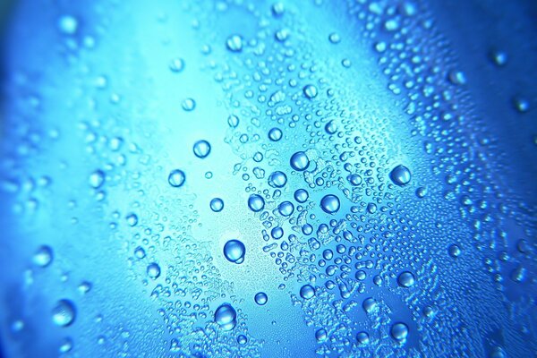 Water drops on the glass close-up