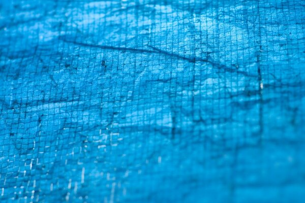 Crumpled blue checkered paper