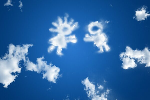 Clouds in the shape of a boy and a girl