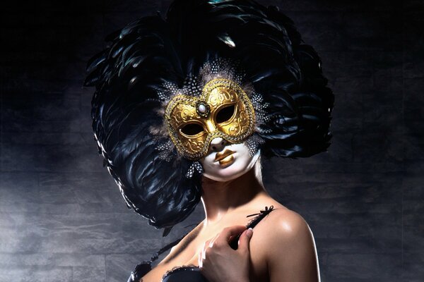 A look from under a golden Venetian mask