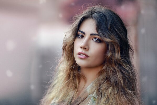 Brown-eyed girl with wavy hair