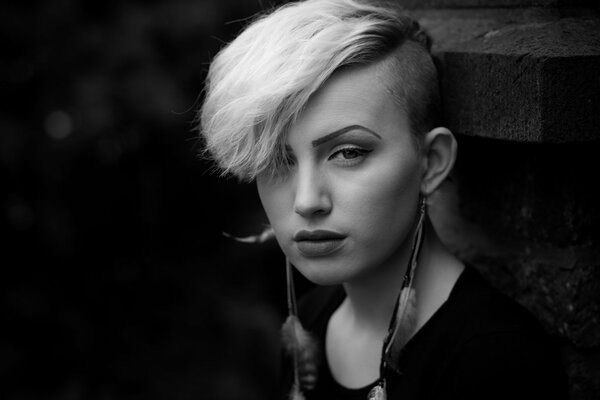 Girl with feather earrings