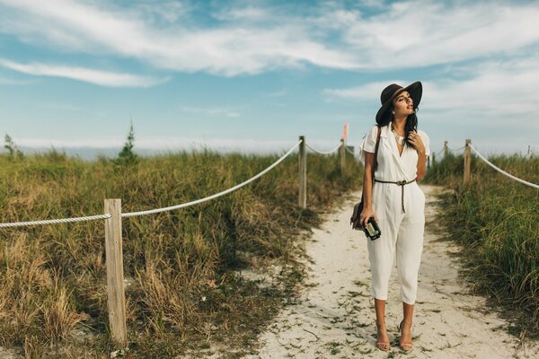 A girl posing in the summer in the field