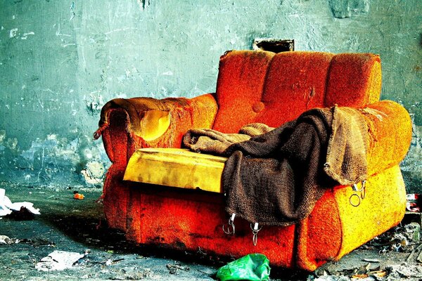 Orange sofa in a burnt-out room