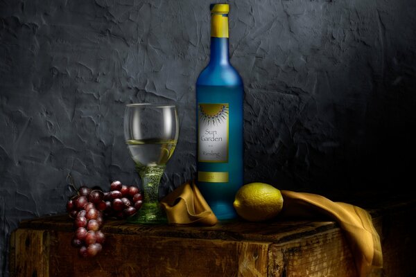 Still-life:a glass of wine grapes and lemon