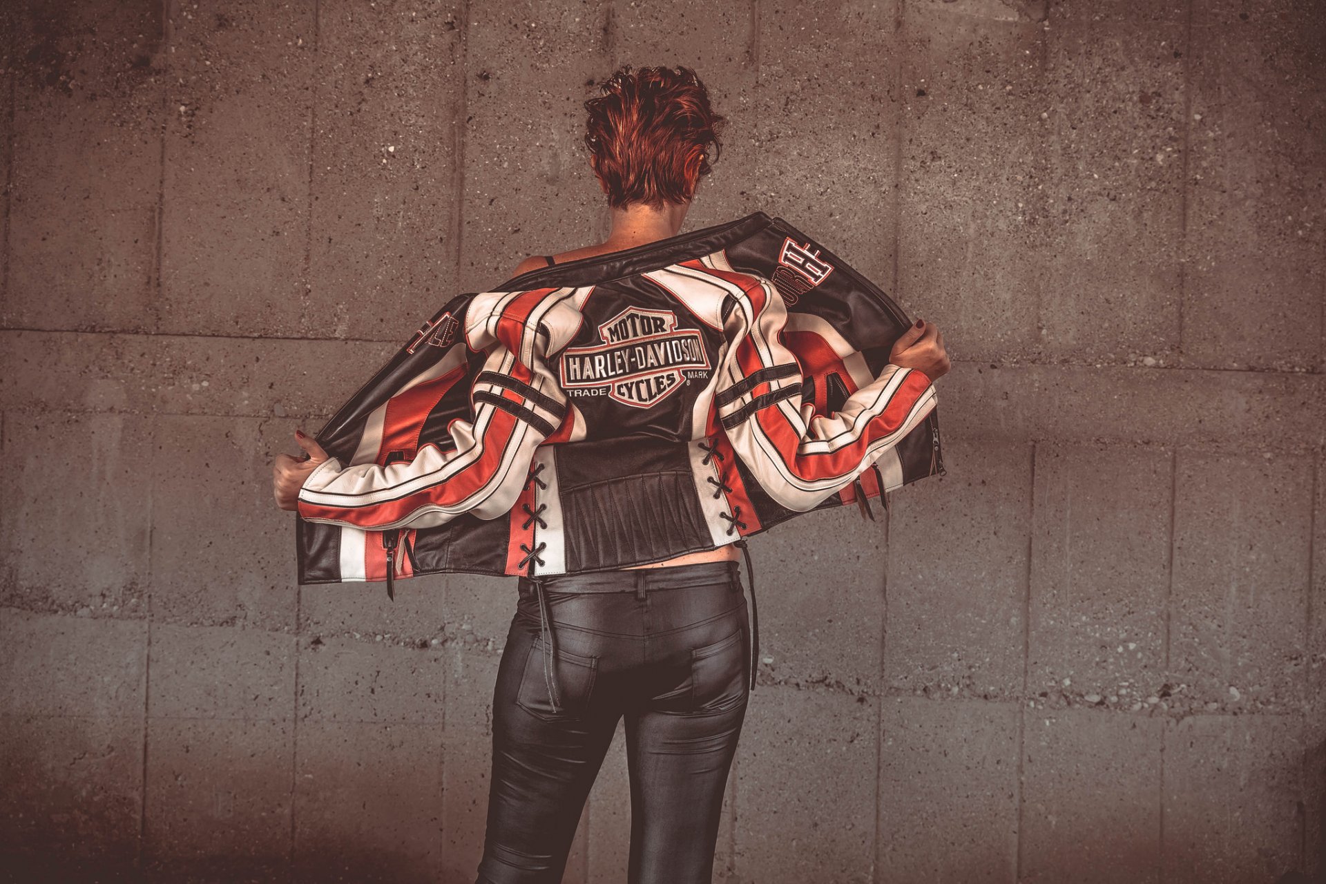 girl spin leather jacket harley-davidson background