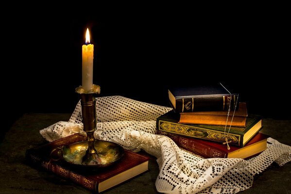 Books candle cross tablecloth