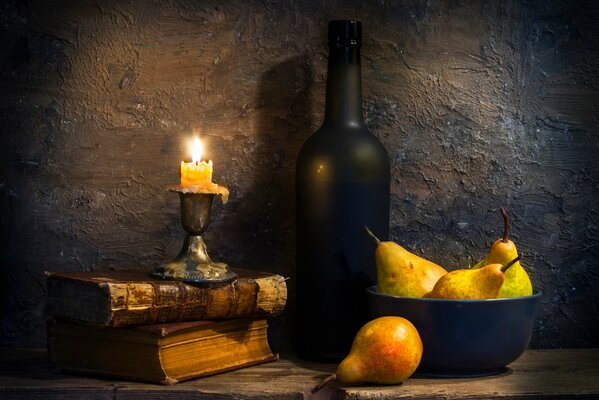 Pears in the dim light of a candle