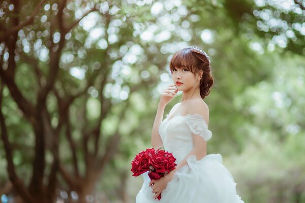 Japanese bride. Tenderness in the forest