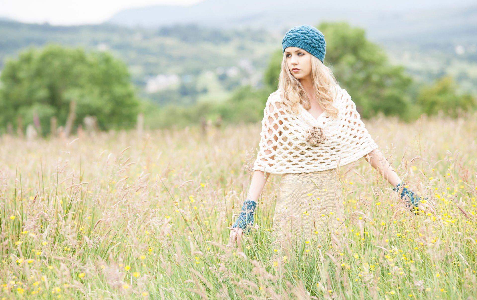 fashion knitted clothes girl takes dress the field