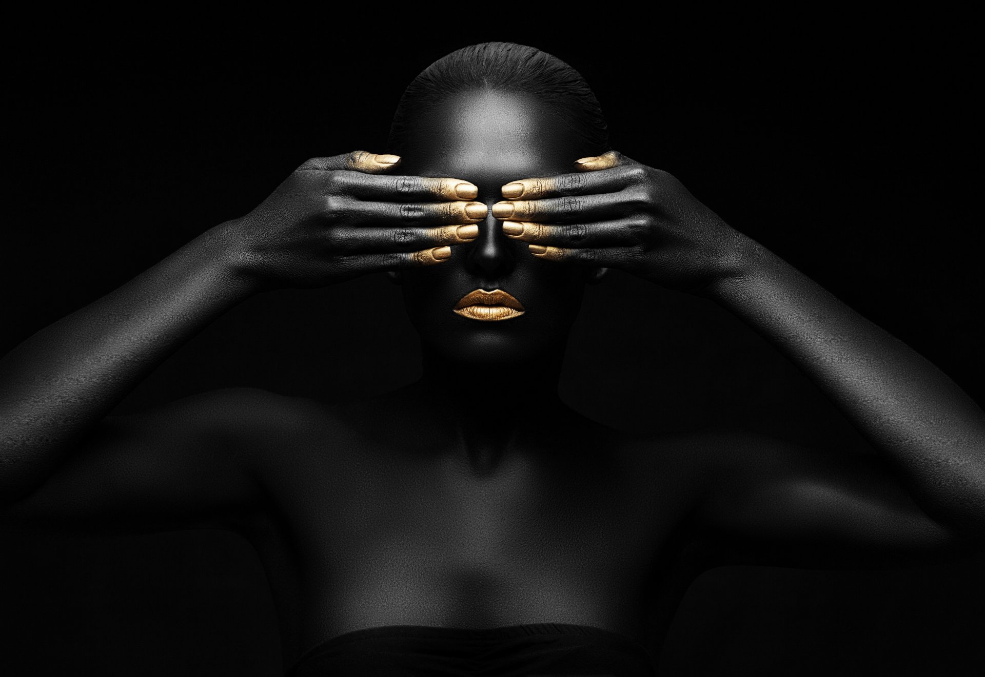 tyle model black eyes closed hands background