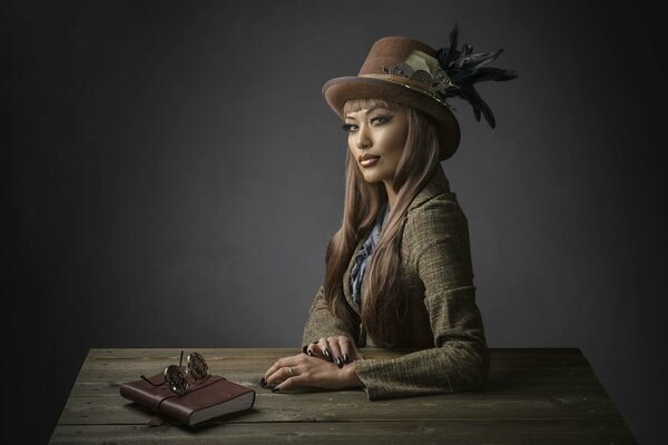 Chica con sombrero steampunk